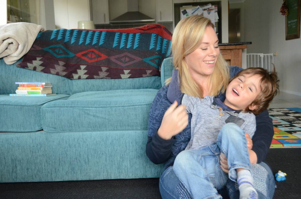 HELP HUGO: The Young family are crowdfunding to raise money for a supportive wheelchair for three-year-old Hugo. He is pictured with his mum Rachael.