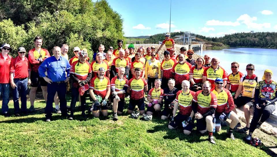 LEGGING IT HOME: The 50+ riders and support crew were all smiles as they took a drink break and a happy snap on the Keepit Dam wall on Friday. It was a big ride for the group who trekked from Dubbo to Tamworth.
