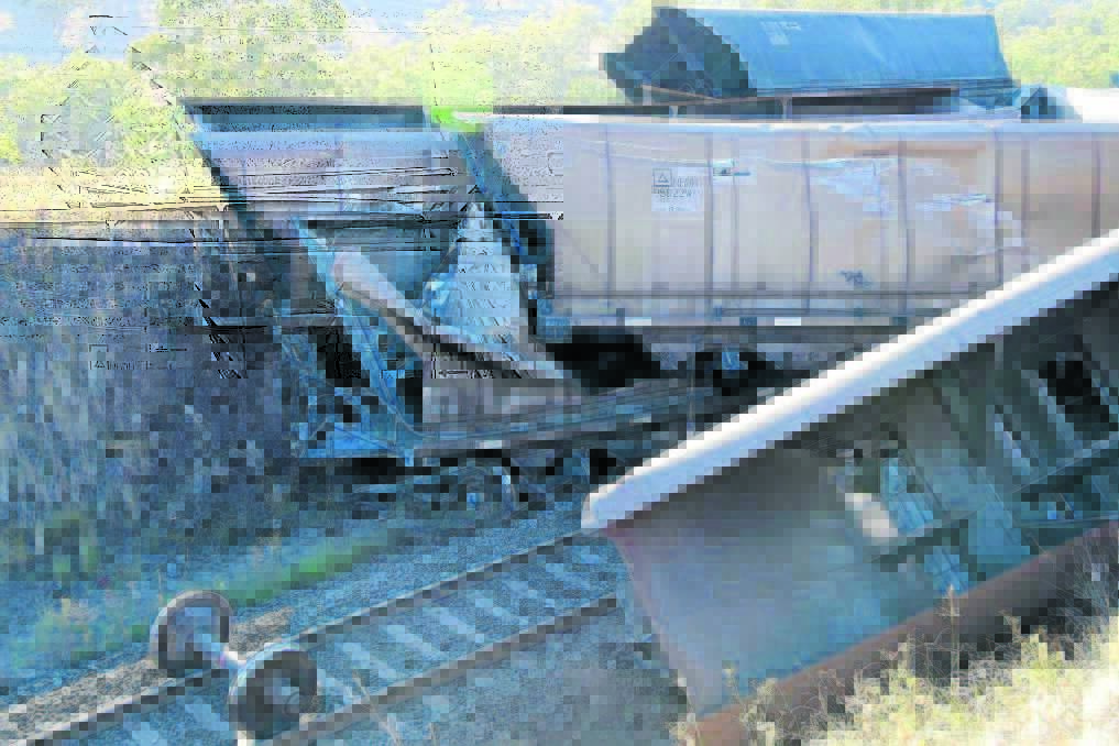Under investigation: The report by the safety regulators into the 2015 train derailment near Willow Tree still hasn't been made public. Photo: Supplied