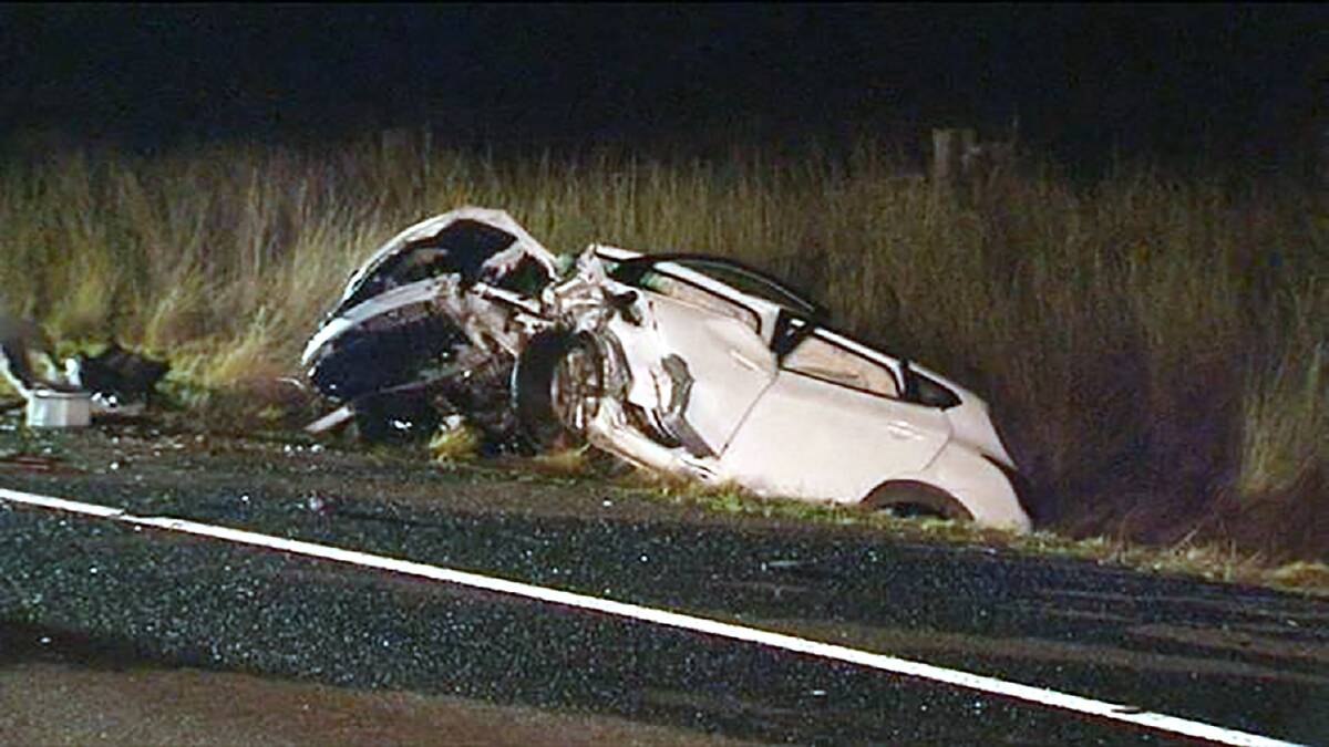 FATAL SCENE: The wreckage of the Nissan Pulsar on the New England Highway near Willow Tree on August 17, 2015. Photo: NBN News