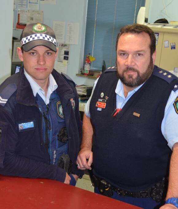 POLICE STATION UPGRADE: Senior Constable Chris Hart, left, with Gunnedah Inspector Paul Johnson inside the outdated police station which has received $1.8 million in the state Budget. 
