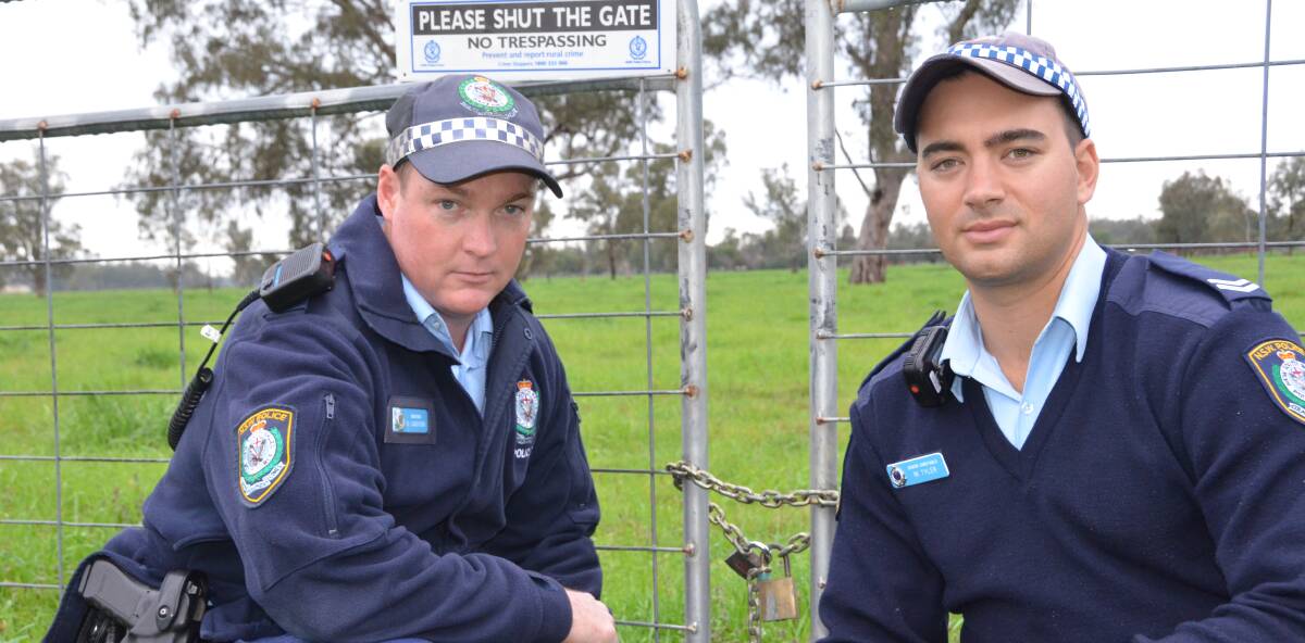 CRIME DROP: Rural crime in the Gunnedah district has dropped in 12 months. Constable Ben Langford left, and Senior Constable Marc Tyler. 