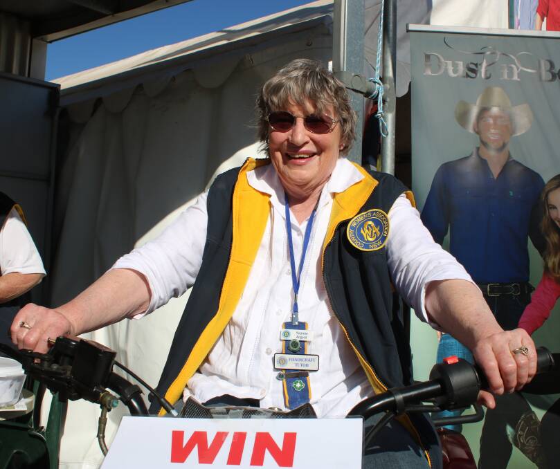 Emerald Hill CWA president Yvonne Argent on a donated quad, which was raffled to raise funds for farmers.