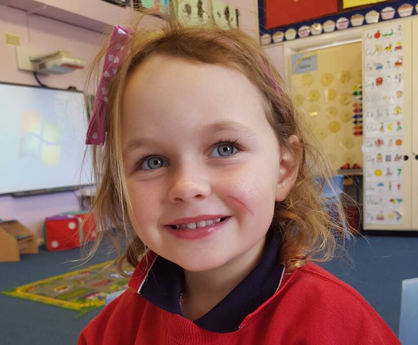 Youngster Aria Brown is an early starter at Carroll Public School.