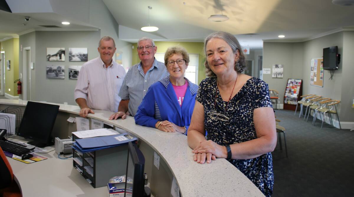 RELIEVED: Mackellar Care Services board members Geoff Dawson, John Perkins, Gae Swain and Sandra Strong in the health centre on Tuesday morning. Photo: Vanessa Höhnke