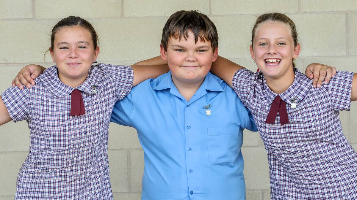St Xavier's Primary School junior librarians: Rhiannan Adamson, Mitchell Herden and Bridget Dridan.