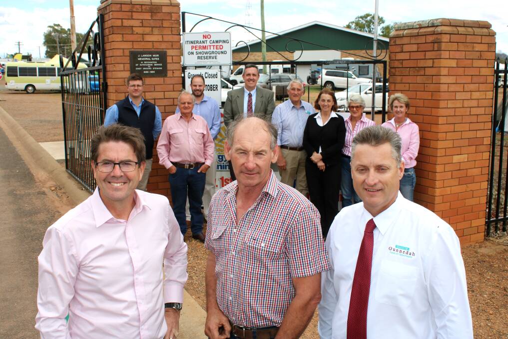 Tamworth MP Kevin Anderson, Gunnedah Show Society president Rob Witts and Gunnedah shire mayor Jamie Chaffey with show society members and council staff at the Gunnedah Showground on Thursday. Photo: Simon Chamberlain