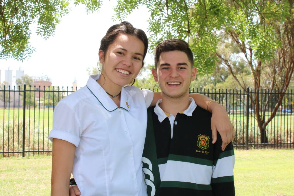 DIVING IN: Friends and school captains, Kustiani Tuckerman and Jaxon Holbrook are all smiles after completing their first HSC exam.