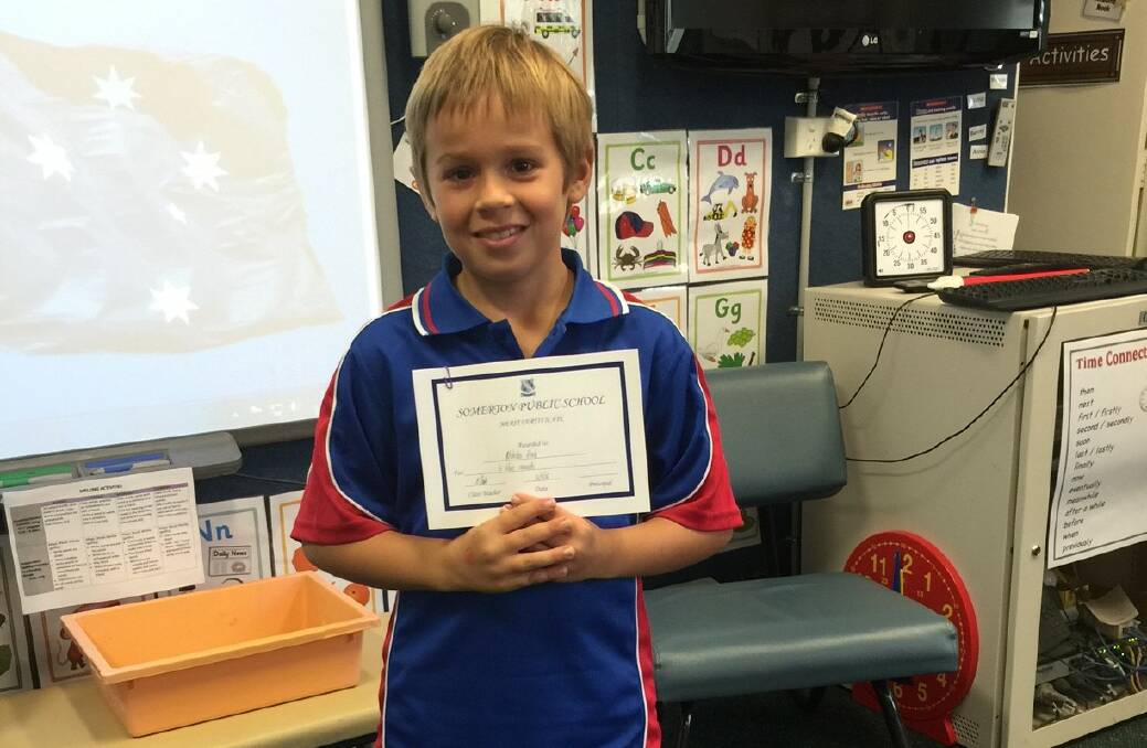 Somerton Public School student Nicholas Hook with his merit award.
