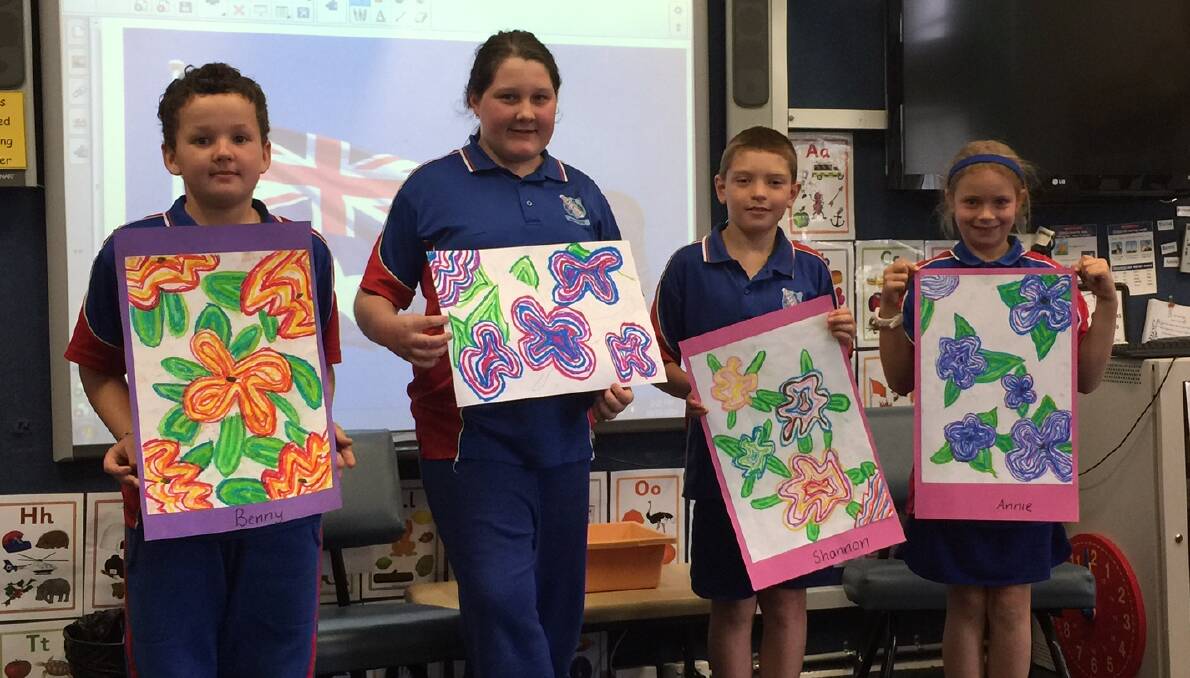 Somerton Public School students Benny Markwick, Naomi Evans, Shannon Colley and Annie Hook show off their artwork.