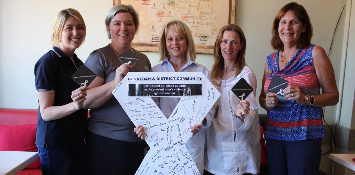 SPREADING THE WORD: Gunnedah Family Support launch White Ribbon coasters in licensed premises with the support of the NSW Police Force.