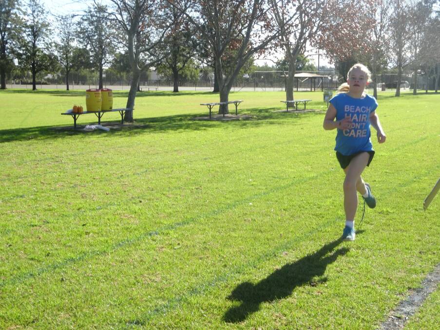 IN ACTION: Josie Luckel puts her competitors to the test during a running event.