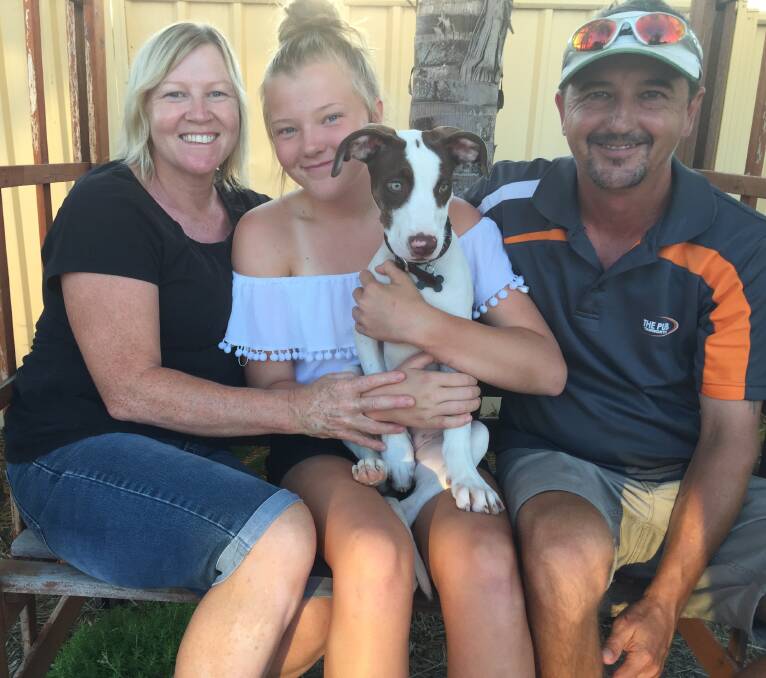 The Hall family with their new pooch, Brandie.