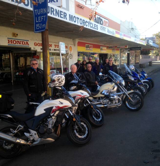 Motorcycle rider Des O' Callaghan will leave Gunnedah on October 9 to take part in a charity ride. He is pictured with other local riders outside the business of one of his sponsors Gordon Turner Motorcycles.