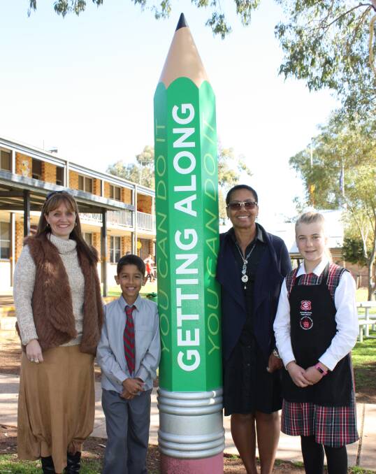 GETTING ALONG: Gunnedah South Public School principal Emma Jeffery, student Nayte Vernon, Canadian principal Marguerite Campbell and student Leisel Torrens. 