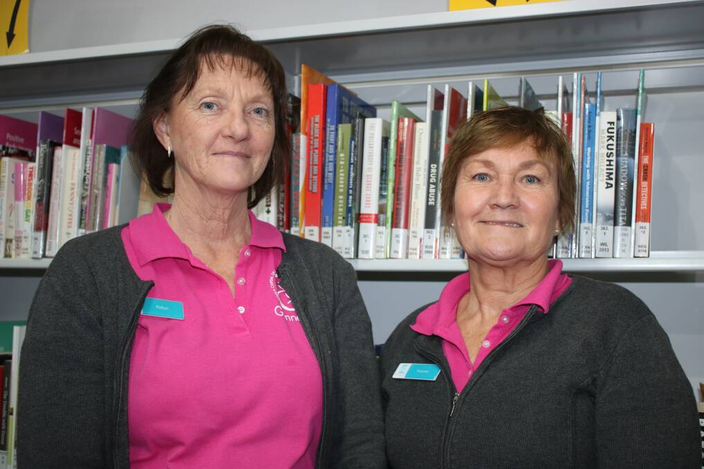 Robyn Draper and Yvonne Reading are ready to give residents a tour of Gunnedah Shire Library as part of Local Government Week.
