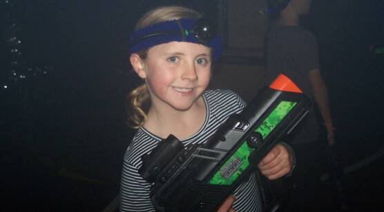 FUN FOR EVERYONE: Lucy Lawrence takes time out from the laser tag event at the Gunnedah PCYC to pose. The funds from the event will go towards youth activities. 