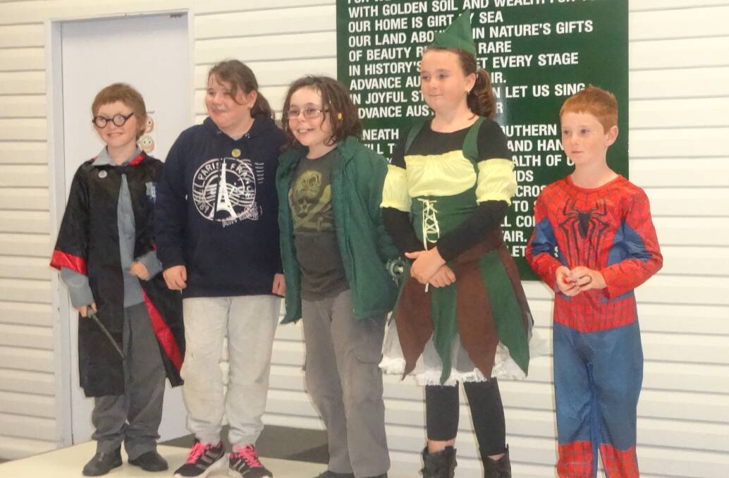 Chucky Bindley, Zoe King, Noah Taylor, Ebony and Tyler Herbert celebrate Book Week at Gunnedah Public School.