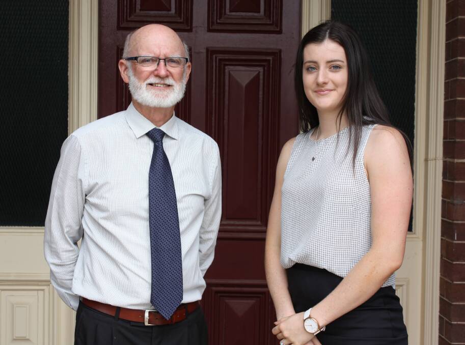 Dux of St Mary's College, Sophie Perkins, with principal Max Quirk.