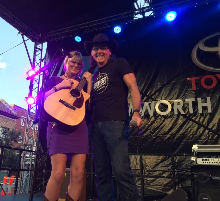 STRUCK A CHORD: 2016/17 Regional Song Contest winner Molly Millington and fRETfEST founder Al Buchan at the 2017 Tamworth Country Music Festival. Photo: Supplied.
