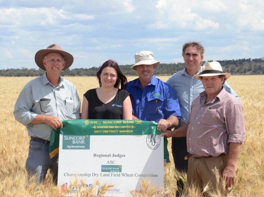 DURUM WHEAT WINNER: Paul Parker, Karli Mathews from Arma Insurance, Nick Connors from Suncorp Bank and Graham Shields present James Vince from Lambrook Pastoral Company with a ribbon for the districts best durum wheat crop. Photo: Billy Jupp