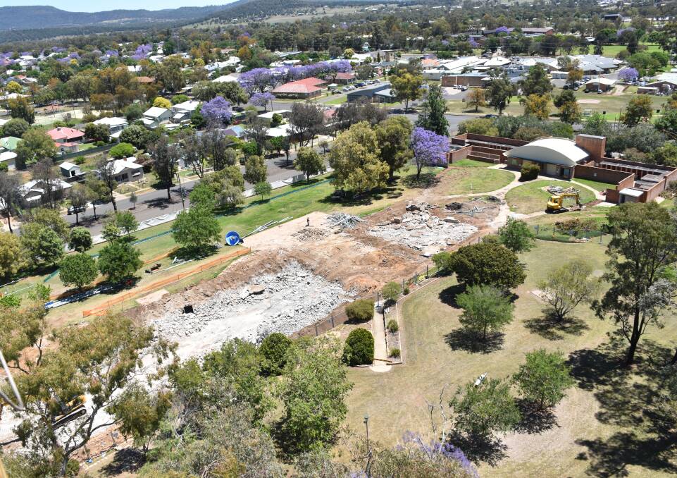 PROGRESS MADE: A birds-eye view of the demolition work of the Gunnedah Memorial Pool renewal project taken from atop the South Street Reservoir. Photo: Supplied