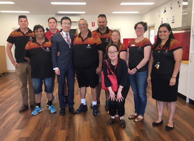 HELPING HAND: Members of the Winanga-Li Aboriginal Child and Family Centre with Shenhua Watermark representatives at the grand opening of the centres new multi purpose room. Photo: Supplied