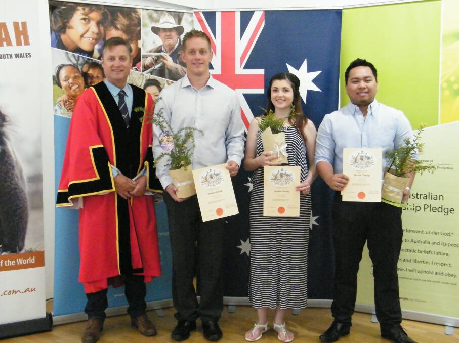 NEW CITIZENS: Mayor Jamie Chaffey with Richard Partiquin, Charlotte Wright and Ric Tobias who join more than 50 new Australians calling Gunnedah home since 2012. Photo: Supplied