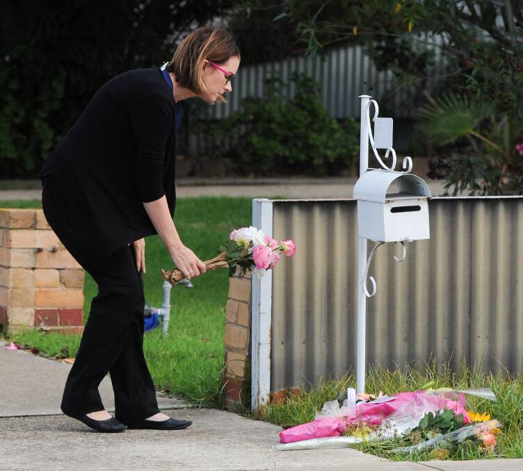 Flowers were placed out the front of Ora Holt's home in Wangaratta after Tuesday's tragic shooting.