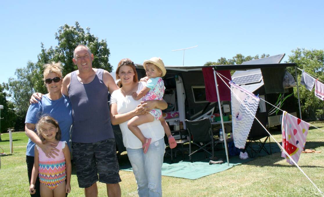 Bid supporters: The Dare family from Tasmania believe Gunnedah would be a great host for the caravan rally. Pictured is Bear and Tim Dare with Daisy, 5, Sarah, and Bella, 2, 