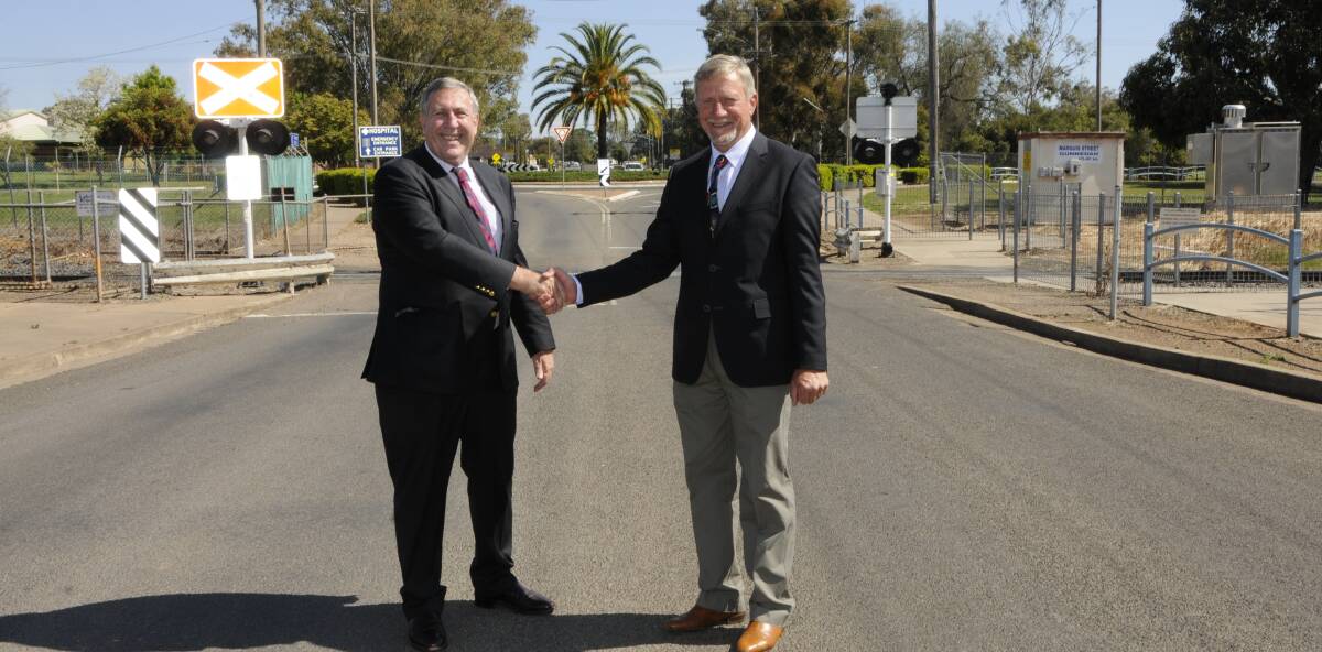 Still waiting: NSW Roads Minister Duncan Gay in Gunnedah with then mayor Owen Hasler for the first rail overpass announcement in 2012.