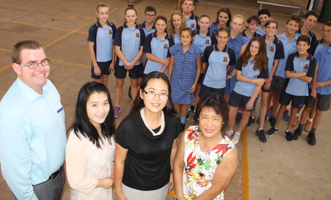 New frontier: St Mary's College Mandarin teacher Scott Harris, language assistants Wuan Fang, Lulu Jia and Helen Cui with students taking part in the language class trial.