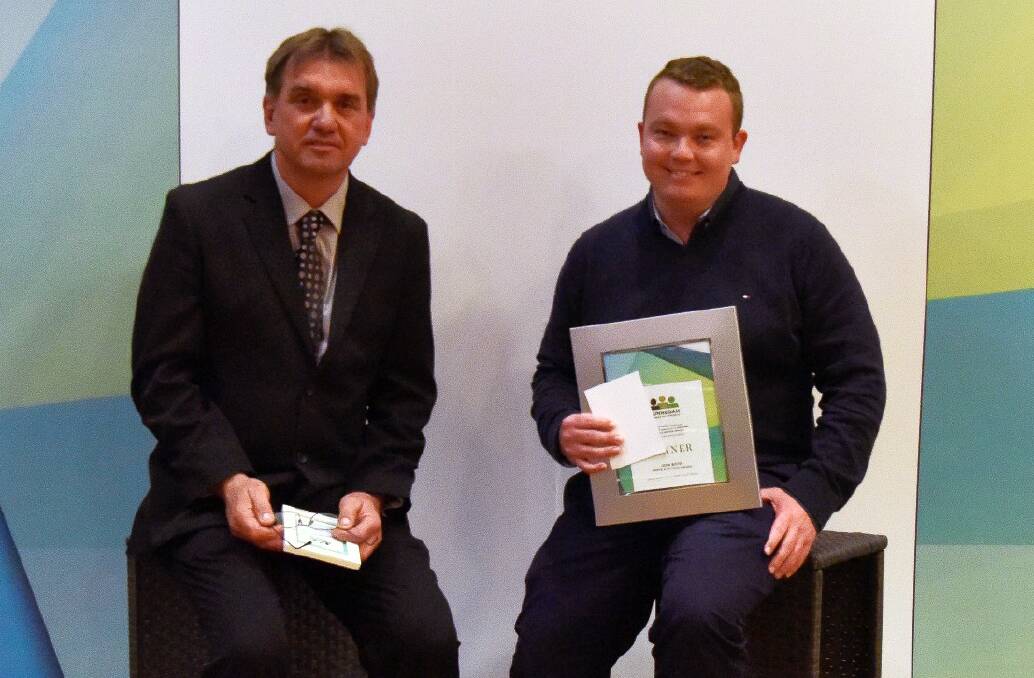 Above and Beyond Award winner Josh Boyd (right) with sponsor Mike Broekman.