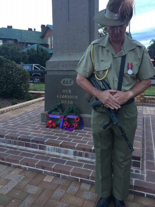 Standing guard: 12/16 Hunter River Lancers Trooper Peter Hall at the Gunnedah Anzac Day dawn service.