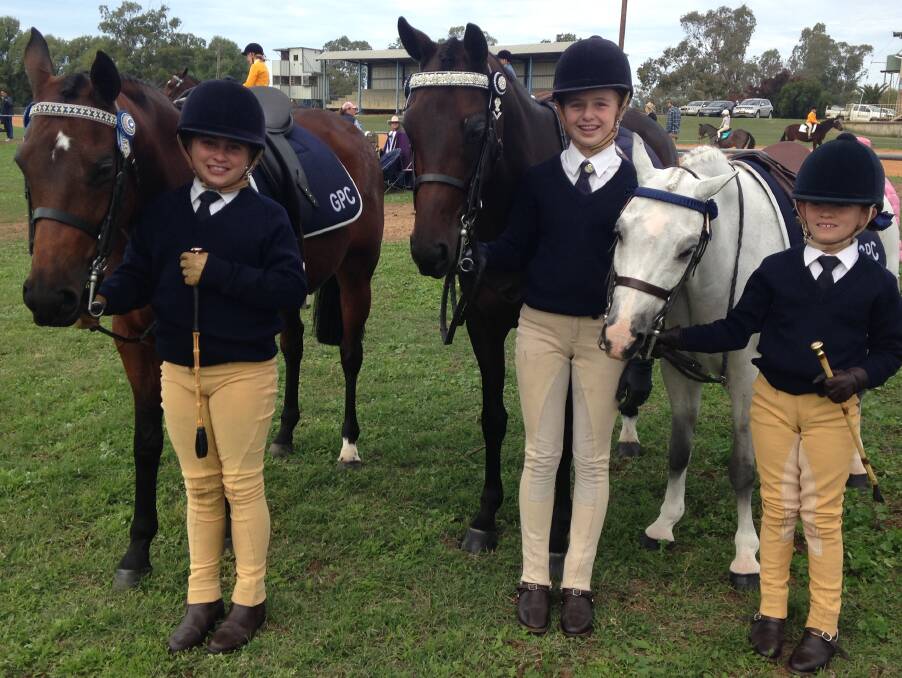 PROUD AS PUNCH: Matilda Snow, Harriet King and Bronte Snow at the Narrabri gymkhana.