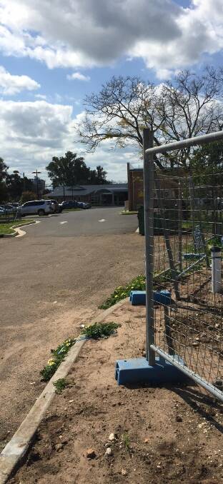 Fences limiting access near construction work at Gunnedah Hospital.