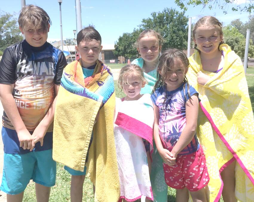 The Tydd and Campbell family enjoy a day out at the Gunnedah pool recently, a popular venue for local families seeking respite from the searing summer heat.