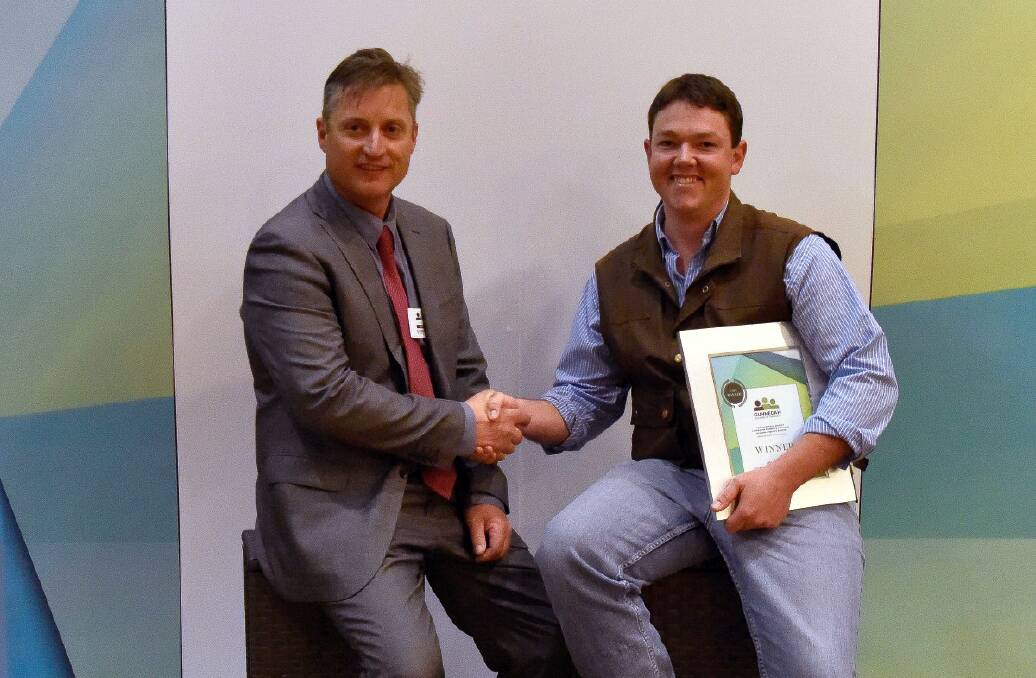 Young Business Executive Award winner, John Martin (right) with Jamie Chaffey from Gunnedah Chamber of Commerce.