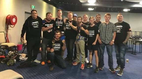 ON FIRE: The Black 'N' Blue Boxing Gunnedah contingent celebrate a successful night in Bathurst. Photo: Supplied