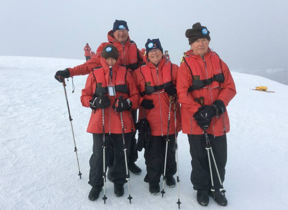 Sunny in Antarctica: Wendy and Bill Brady with Lennox and Ann Maree Waugh with their Gunnedah's Project Koala badges in Antarctica.
