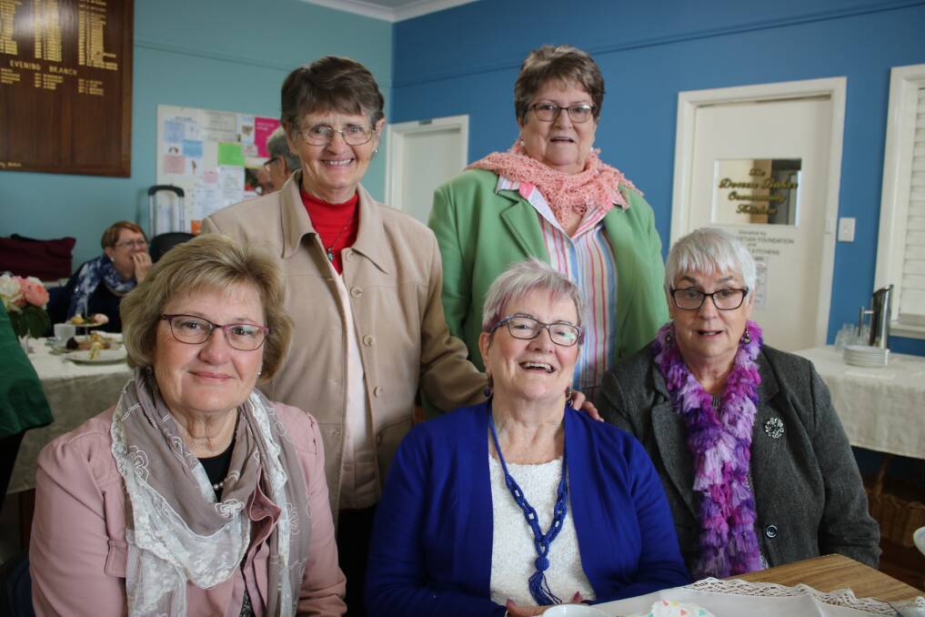 Manilla CWA: Back, from left, Jan Keys and Michelle Eggins. Front, from left, Trish Aust, Dawn Gategood and Merrylin McMahon celebrate Gunnedah branch turning 95 on Thursday. Photo: Vanessa Höhnke
