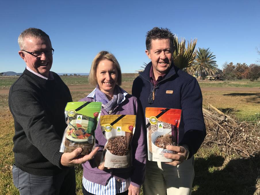 GAME CHANGER: Federal Member for Parkes, Mark Coulton, Lively Linseed’s Jacqueline Douglas, and Assistant Minister to the Deputy Prime Minister, Luke Hartsuyker. Photo: Contributed