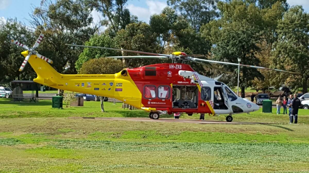 WELCOME: Dozens of locals took the opportunity to welcome and photograph the new $18 million Westpac Rescue Helicopter when it touched down in Gunnedah on Wednesday. 