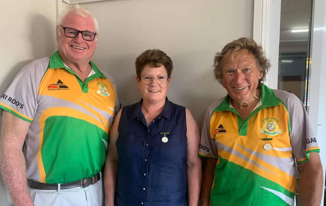 Greg with his wife, Sue, and fellow committee member Keith Grover, when the latter two were awarded life membership with the Kangaroos late last year. Picture by Boggabri and District Rugby League Football Club. 