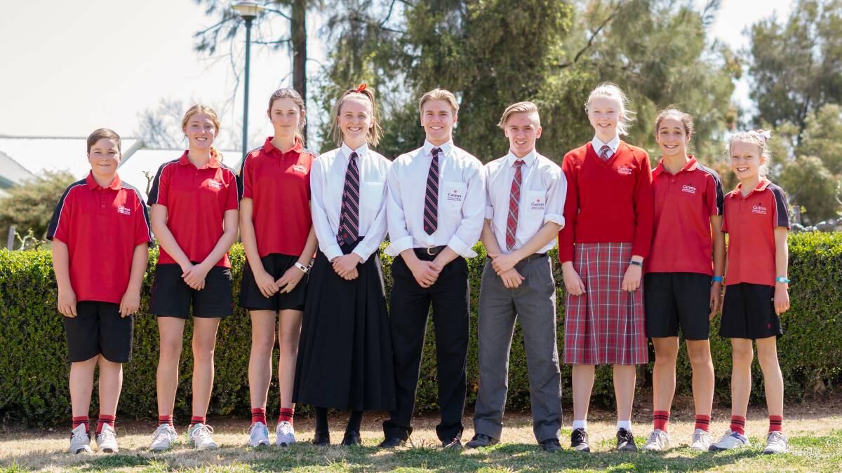 Top effort: Carinya students Mitchell Clarke (centre) and brother Zachary Clarke (fourth in from right) competed at the recent CIS Championships.