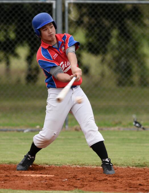 Batter up: Gunnedah's Jason Wang swings at this pitch during the Giants' first round Tamworth Baseball competition clash with Armidale Outlaws on Saturday. Photo: Gareth Gardner 220417GGD09