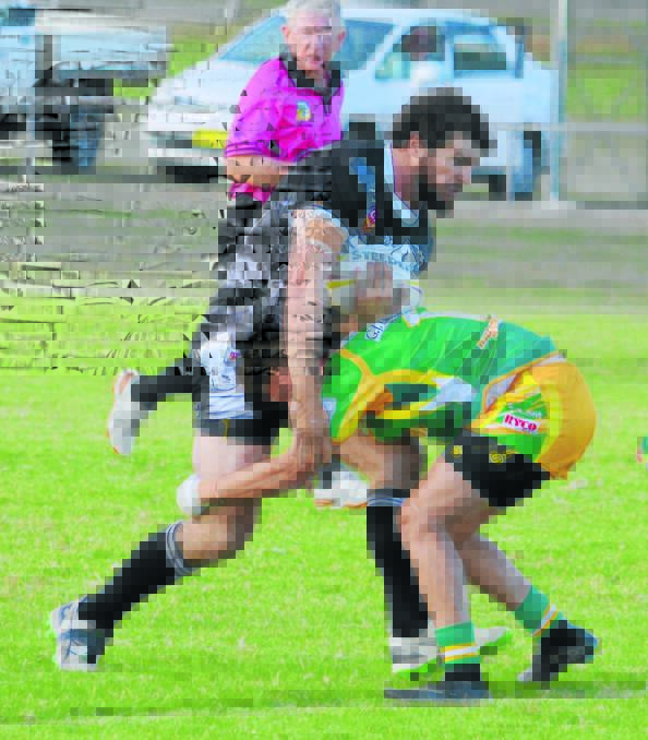 A Boggabri player goes into defence mode during an earlier game. Photo: Chris Bath