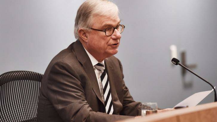 Justice Peter McClellan outlines redress issues at the royal commission on Friday: government would foot nearly half the bill. Photo: Nick Moir