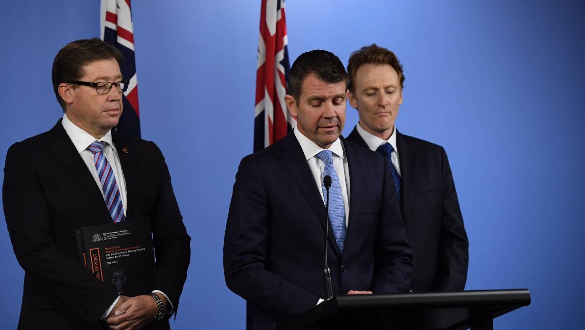 INDUSTRY BAN: NSW Premier Mike Baird and Deputy Premier Troy Grant reveal the findings of the Special Commission of Inquiry report on Thursday afternoon. Photo: Peter Rae