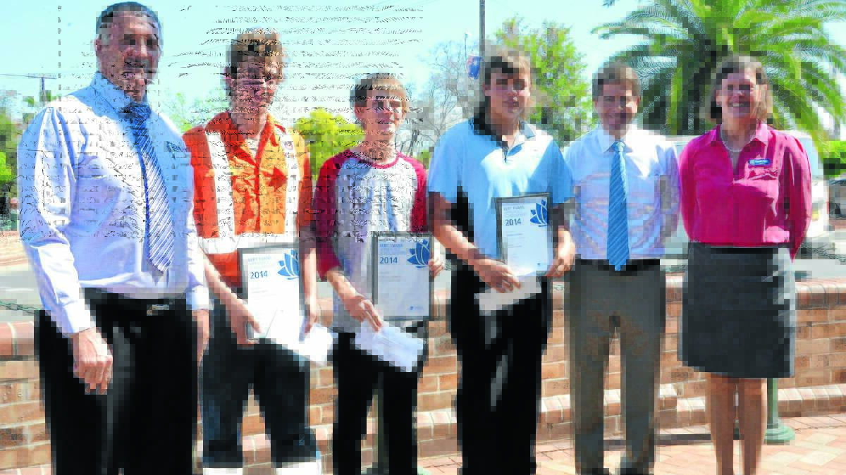 BERT Evans Apprentice Scholarships were handed to three Gunnedah apprentices on Monday. Pictured from left, regional manager State Training Services Greg Poetschka, Thomas Witts (GBP Cranes), Matthew Crookall (Allmac Electrics), Brendan Howes (Mornington Butchery), Member for Tamworth Kevin Anderson and TAFE New England manager customer support Christine Nash.